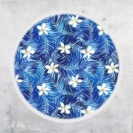 Bobums Round Blue Hibiscus Microfiber Towel featuring a blue tropical leaf print with white hibiscus flowers.