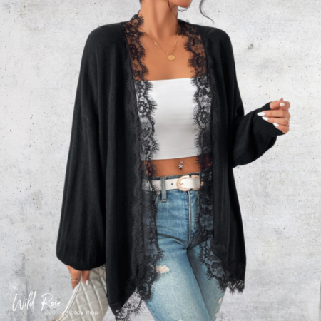 Black Lace-Trim Open Cardigan featuring a lightweight black design with delicate lace detailing along the front edges and sleeves, styled over a white crop top and blue jeans.