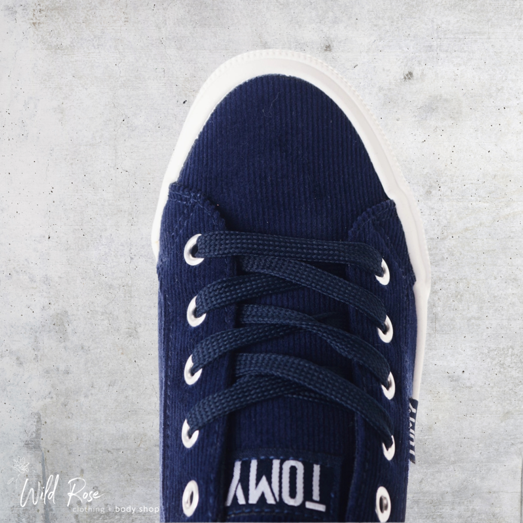 Navy Blue Tomy Sneakers featuring a textured navy-blue upper, matching laces, silver-tone eyelets and a contrasting white sole.