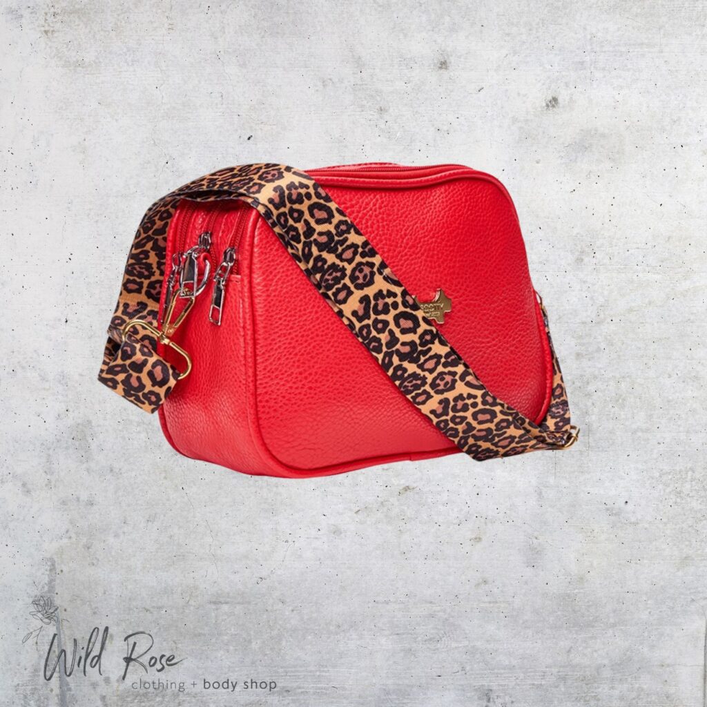 Scotty Bags & Co. Lipstick Red Triple Zipper Crossbody Bag with a bold red finish and leopard-print strap and detailing.