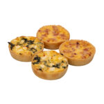 Party Bites Mini Quiches with golden pastry crusts and assorted savoury fillings, including spinach and cheese.
